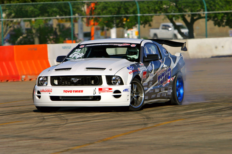 Ken Gushi drifts his 2005 Mustang GT into victory lane for the first time